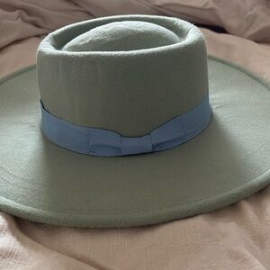 Light green, blue bow tie, brim hat